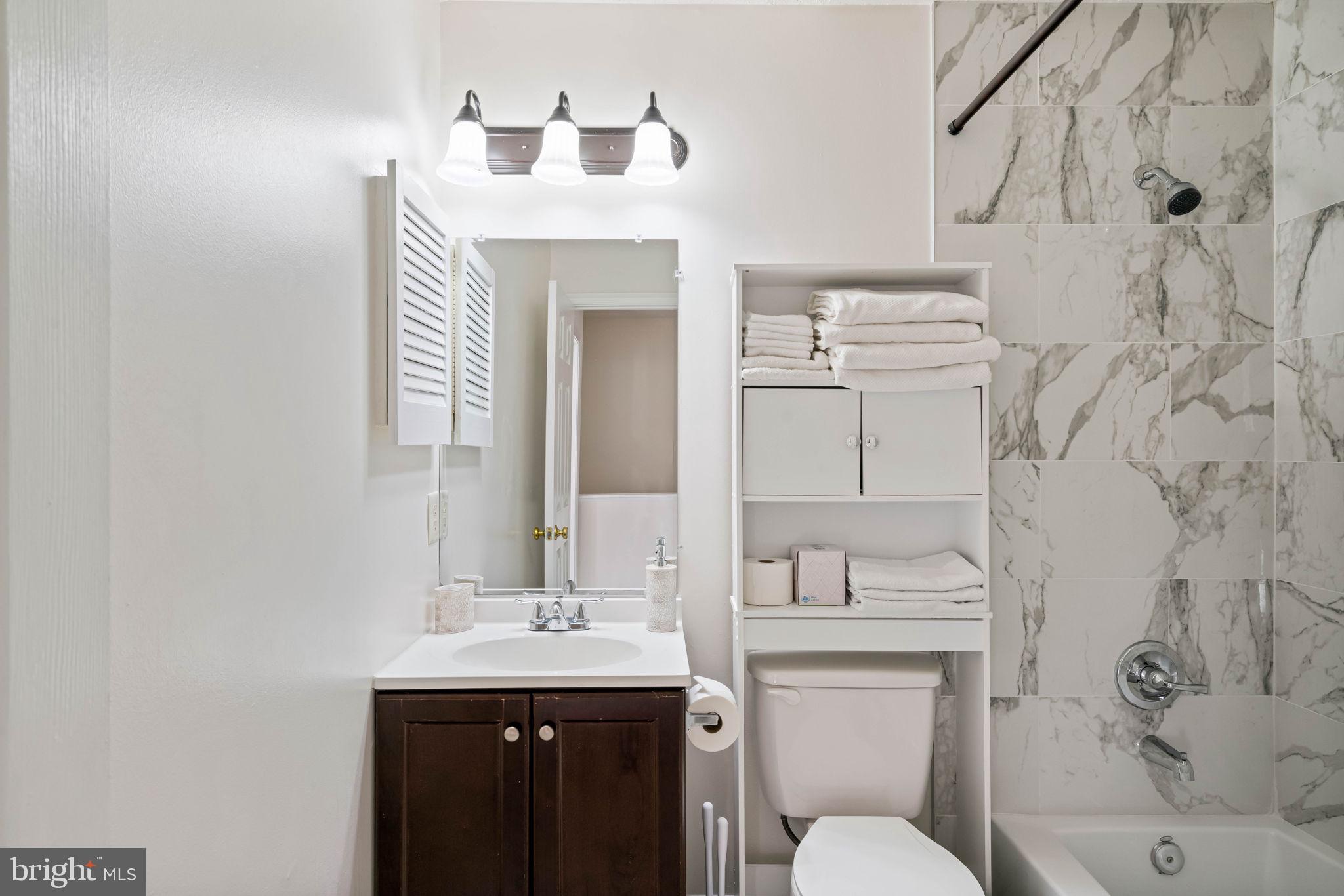 407 Kings Crest Drive Stafford, VA 22554 - Photo 24 of 42 a bathroom with a sink and a toilet