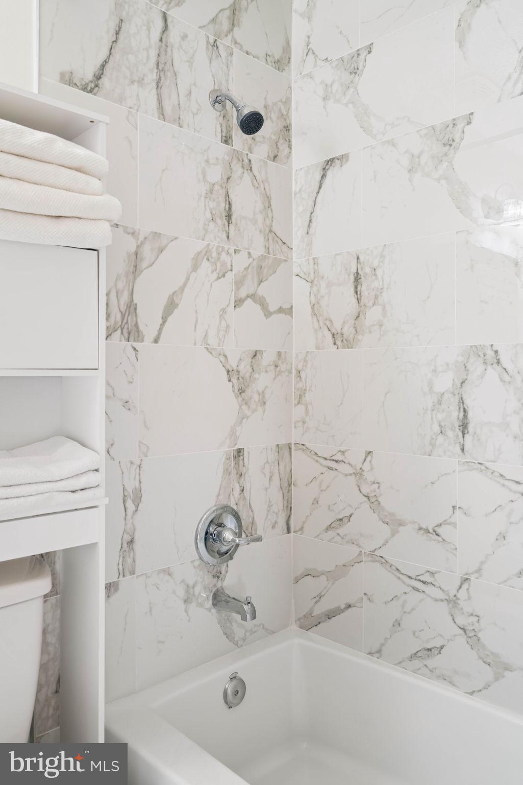 407 Kings Crest Drive Stafford, VA 22554 - Photo 25 of 42 a bathroom with a bathtub and shower