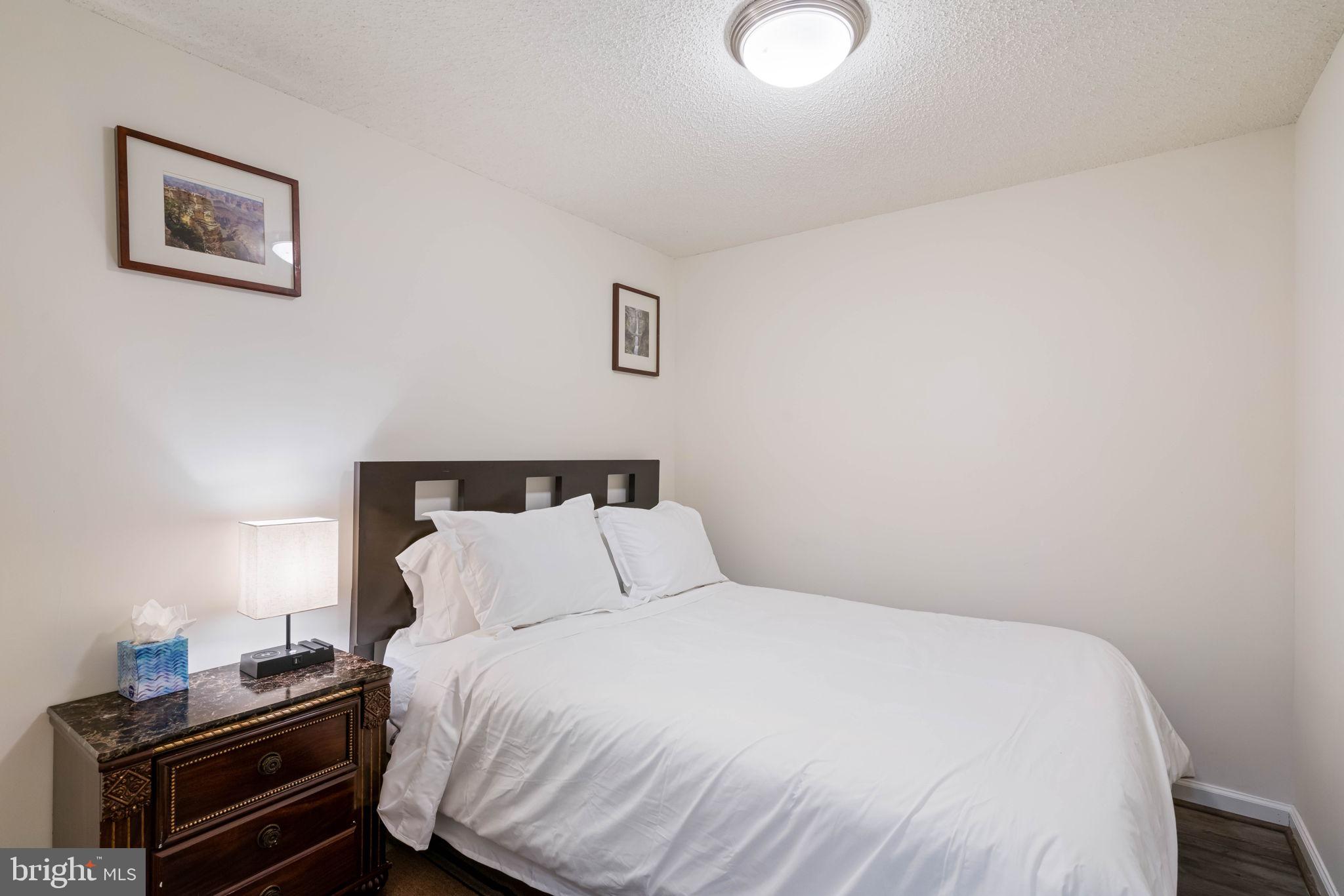 407 Kings Crest Drive Stafford, VA 22554 - Photo 26 of 42 a bedroom with a bed and a desk