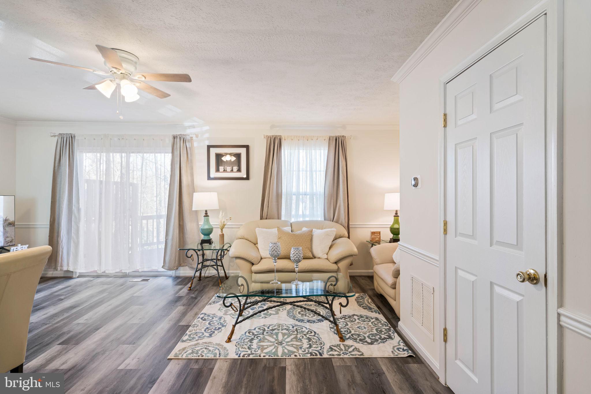 407 Kings Crest Drive Stafford, VA 22554 - Photo 3 of 42 a living room with furniture and a wooden floor