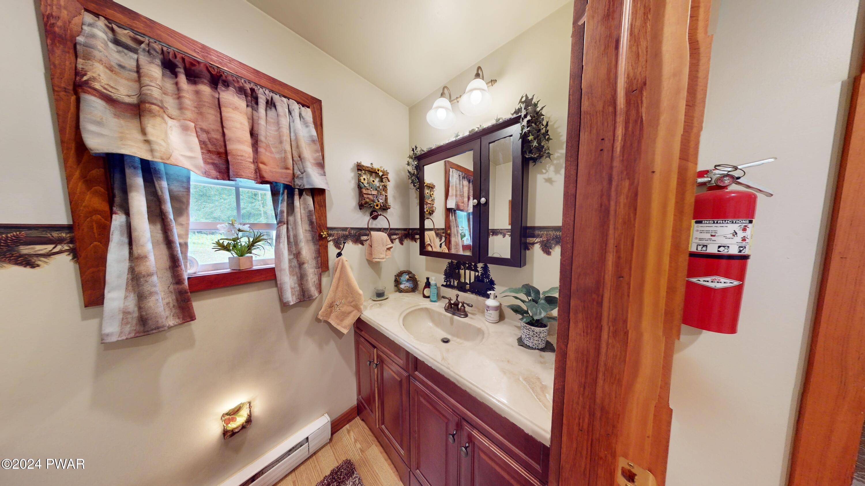 644 Raymondskill Road Milford, PA 18337 - Photo 35 of 65 -Raymond644skill-Rd- Half Bathroom