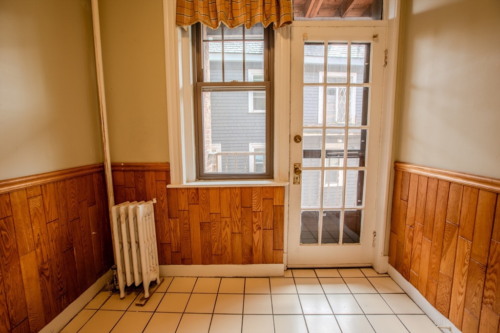 153 Strathmore Road, Unit 4 Boston, MA 02135 - Photo 9 of 9 a view of an entryway with a door