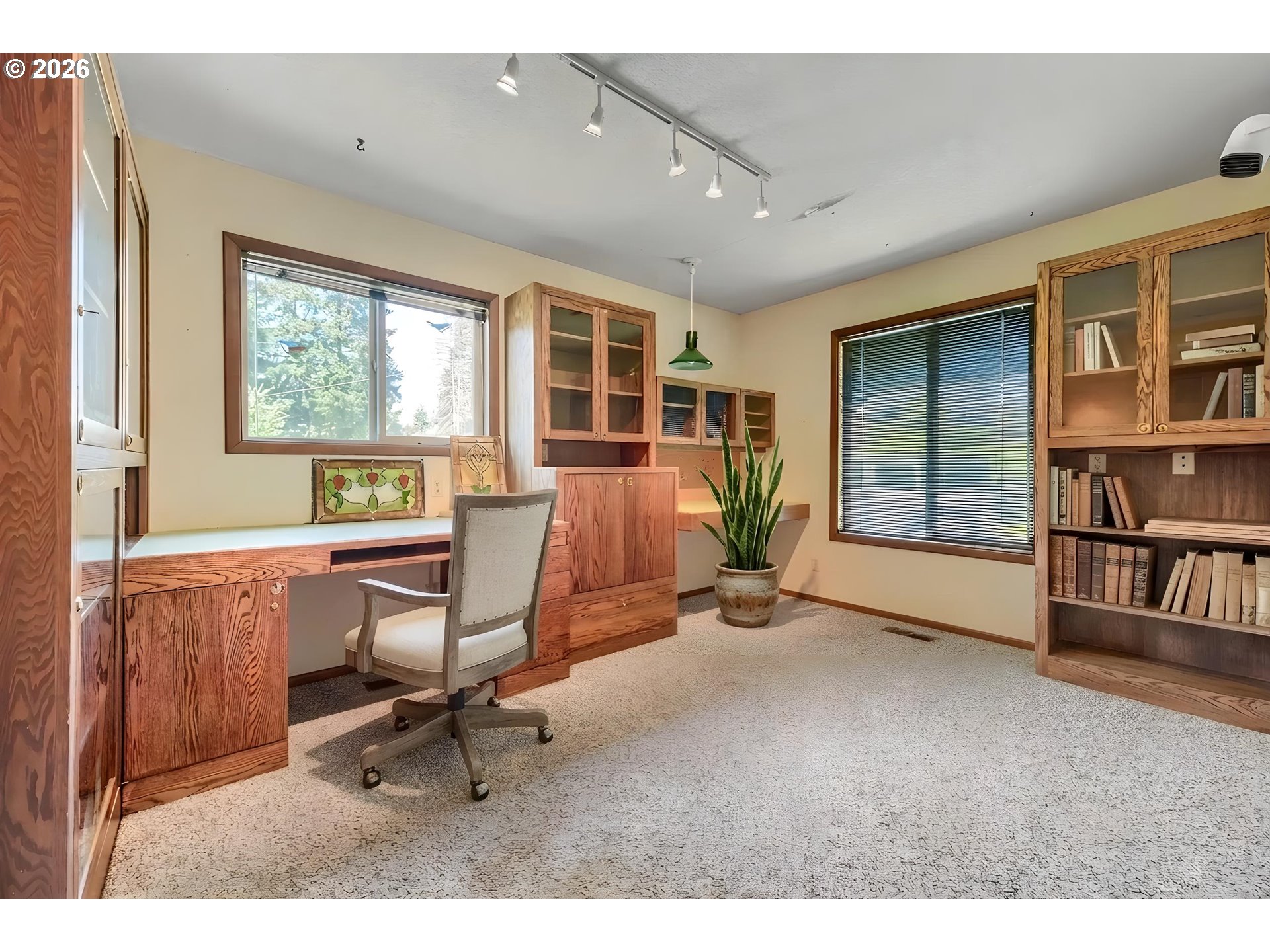 45354 Northwest Hartwick Road Banks, OR 97106 - Photo 14 of 35 a view of a workspace with furniture and a window