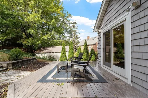 a view of roof deck with patio