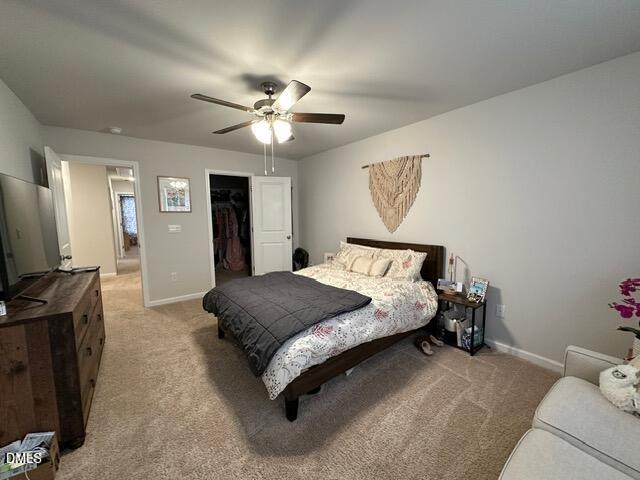 517 Flat Ford Road Hillsborough, NC 27278 - Photo 16 of 27 a spacious bedroom with a bed and a flat screen tv