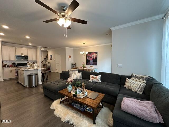 517 Flat Ford Road Hillsborough, NC 27278 - Photo 9 of 27 a living room with furniture kitchen view and a chandelier