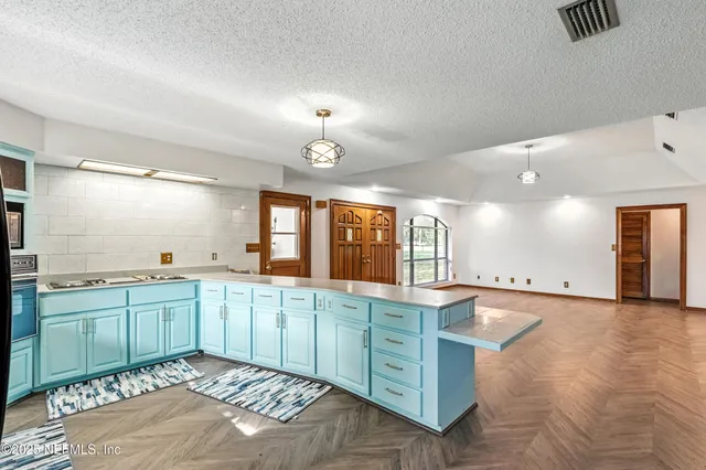 a large bathroom with double vanity and a mirror