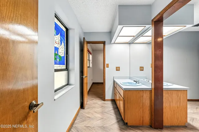 a view of hallway with washer and dryer