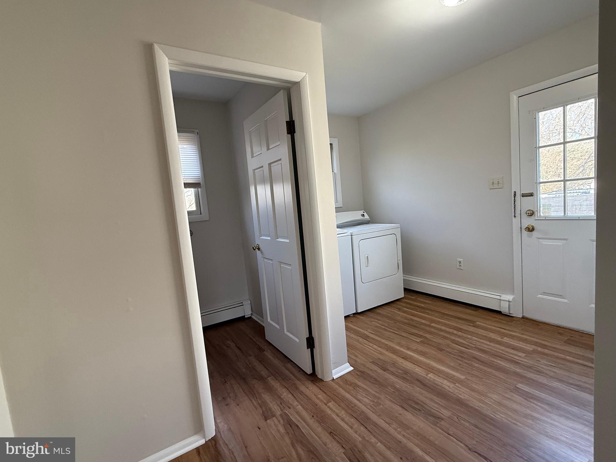 121 East Harmony Road West Grove, PA 19390 - Photo 17 of 50 a view of an empty room with wooden floor and a window
