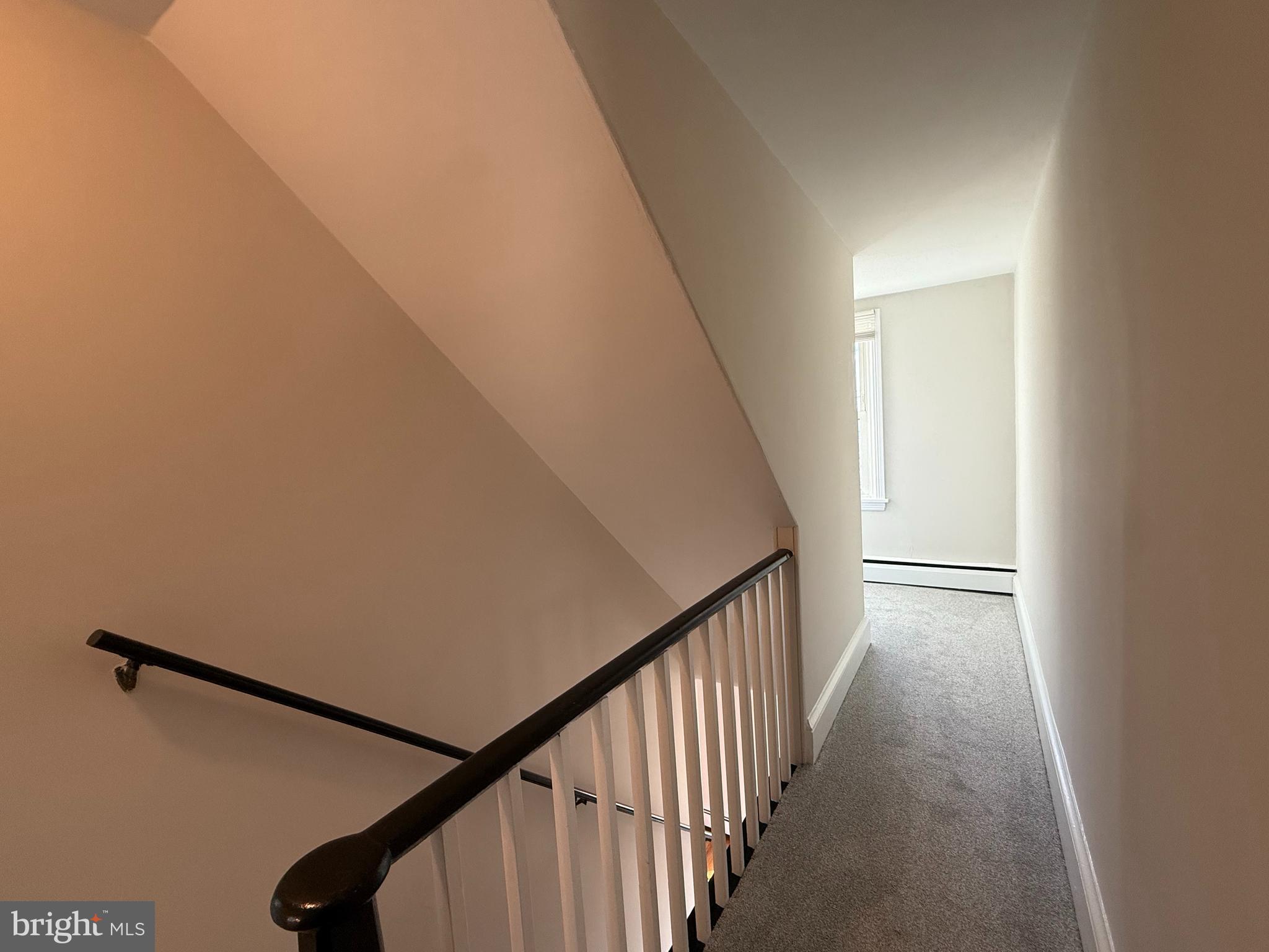 121 East Harmony Road West Grove, PA 19390 - Photo 36 of 50 a view of a hallway with wooden floor and staircase