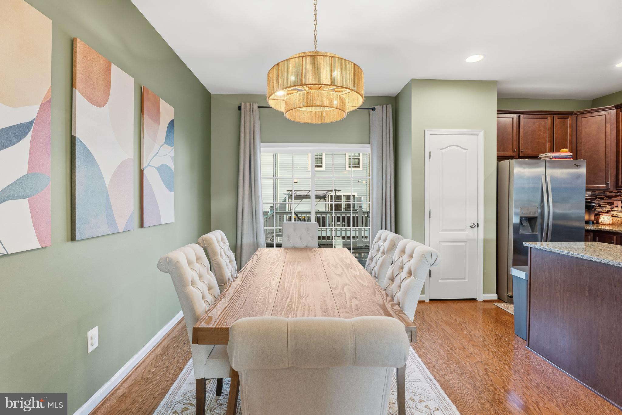 980 Winter Run Road Middle River, MD 21220 - Photo 15 of 43 a view of a dining room with furniture window and wooden floor