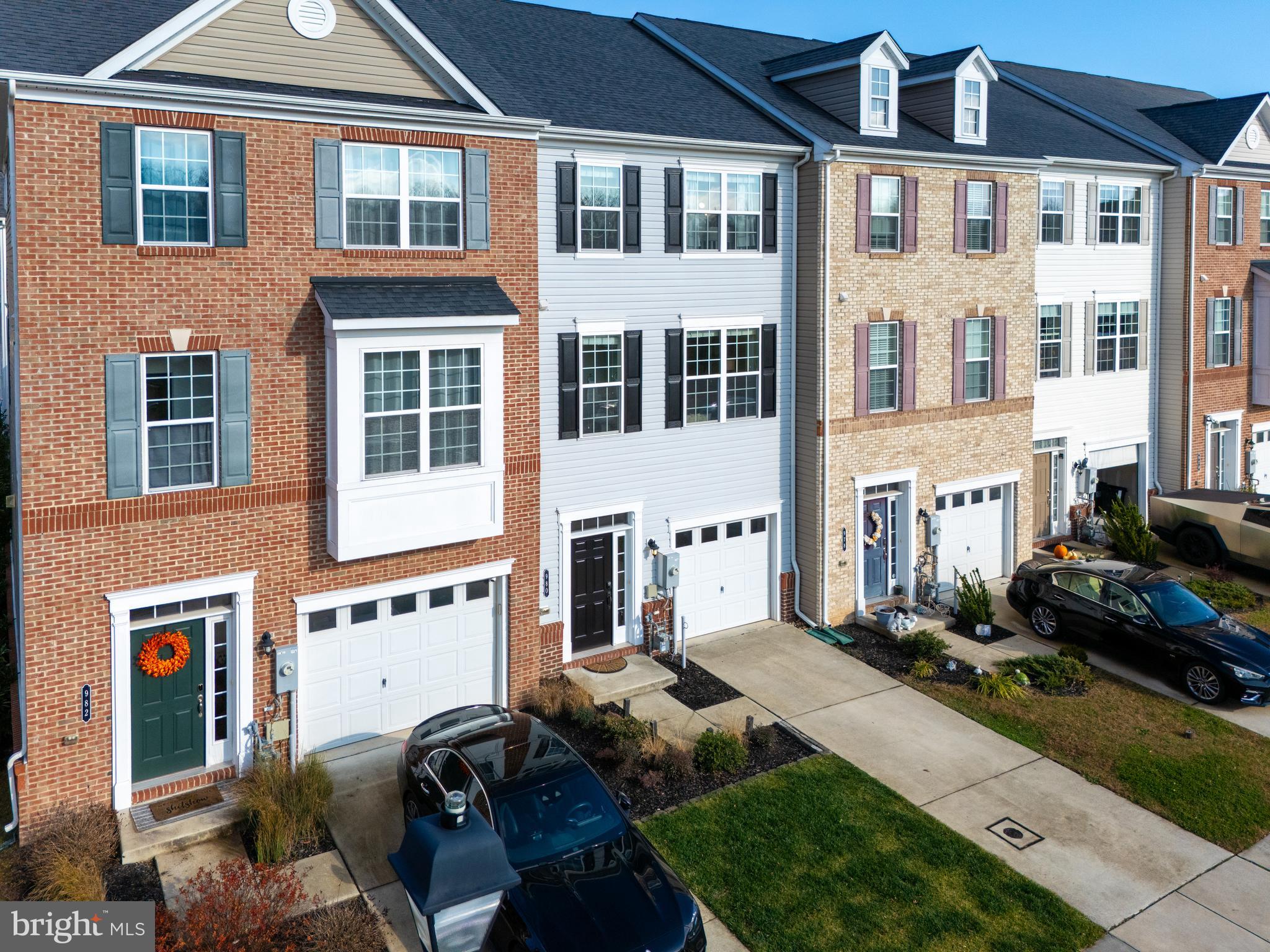 980 Winter Run Road Middle River, MD 21220 - Photo 2 of 43 a front view of a residential apartment building with a yard