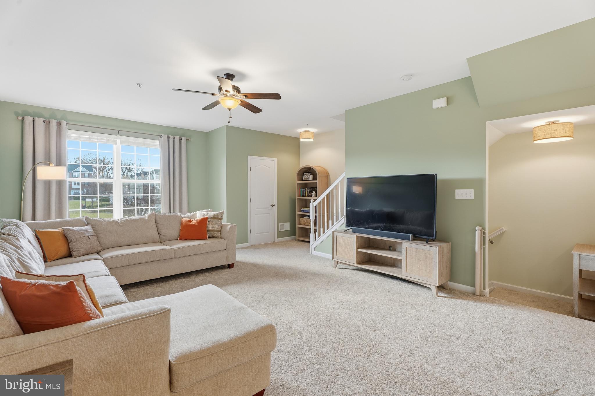 980 Winter Run Road Middle River, MD 21220 - Photo 21 of 43 a living room with furniture and a flat screen tv