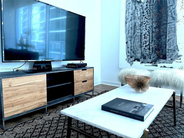 a room with a table and chairs