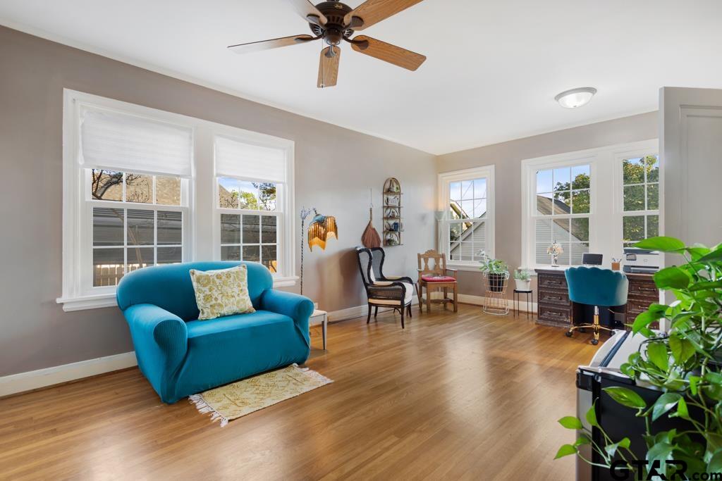 107 Rowland Place Tyler, TX 75701 - Photo 11 of 42 a living room with furniture and a large window
