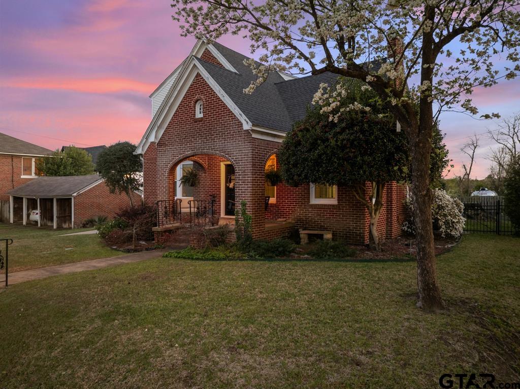 107 Rowland Place Tyler, TX 75701 - Photo 35 of 42 a front view of a house with a yard