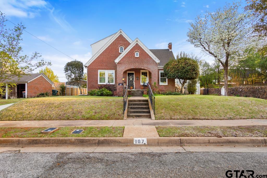 107 Rowland Place Tyler, TX 75701 - Photo 40 of 42 a front view of a house with a yard