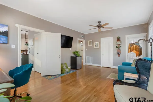 a living room with furniture and a window