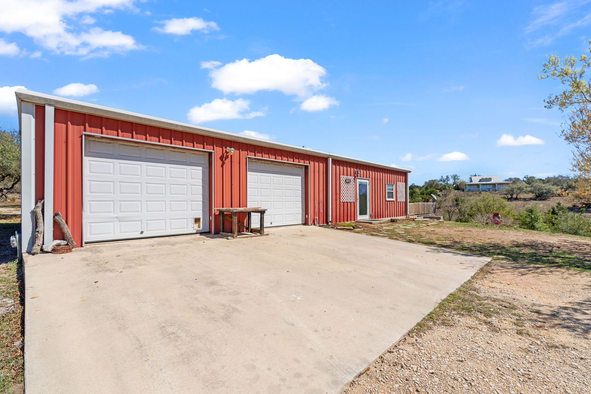 6350 Mt Sharp Road, Unit B Wimberley, TX 78676 - Photo 20 of 34 a view of garage and yard