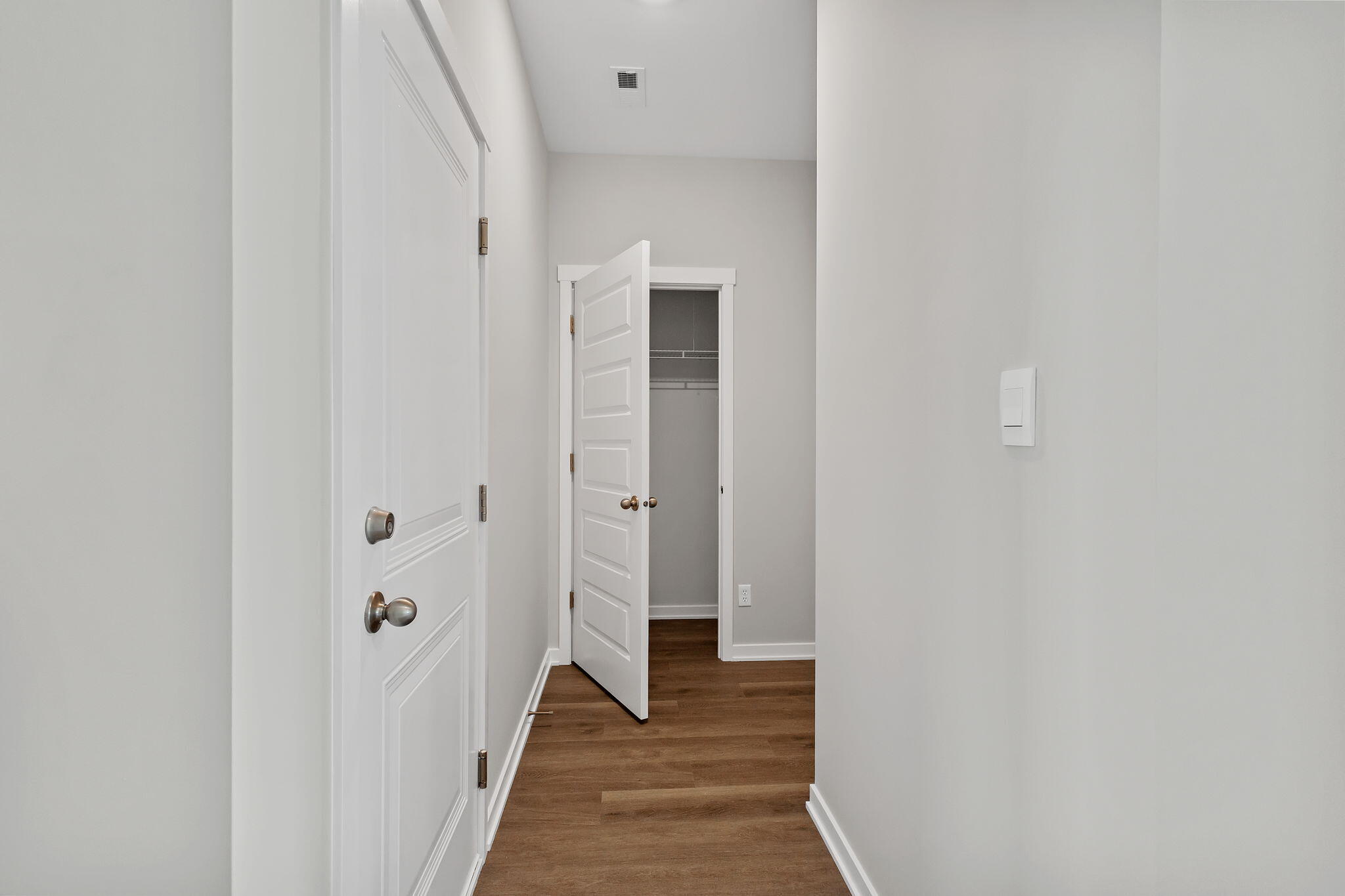 433 Fry Street Hebron, IN 46341 - Photo 11 of 24 a view of a hallway with wooden floor and entryway