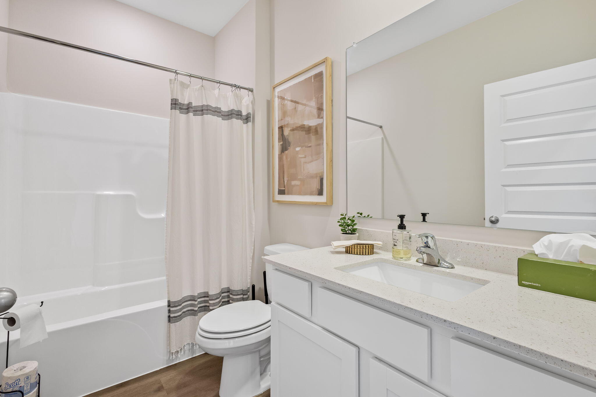 433 Fry Street Hebron, IN 46341 - Photo 21 of 24 a bathroom with a sink a toilet and shower