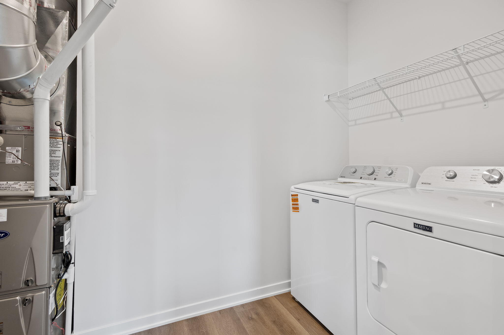 433 Fry Street Hebron, IN 46341 - Photo 24 of 24 a utility room with dryer and washer