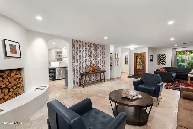 a dining room with furniture and window