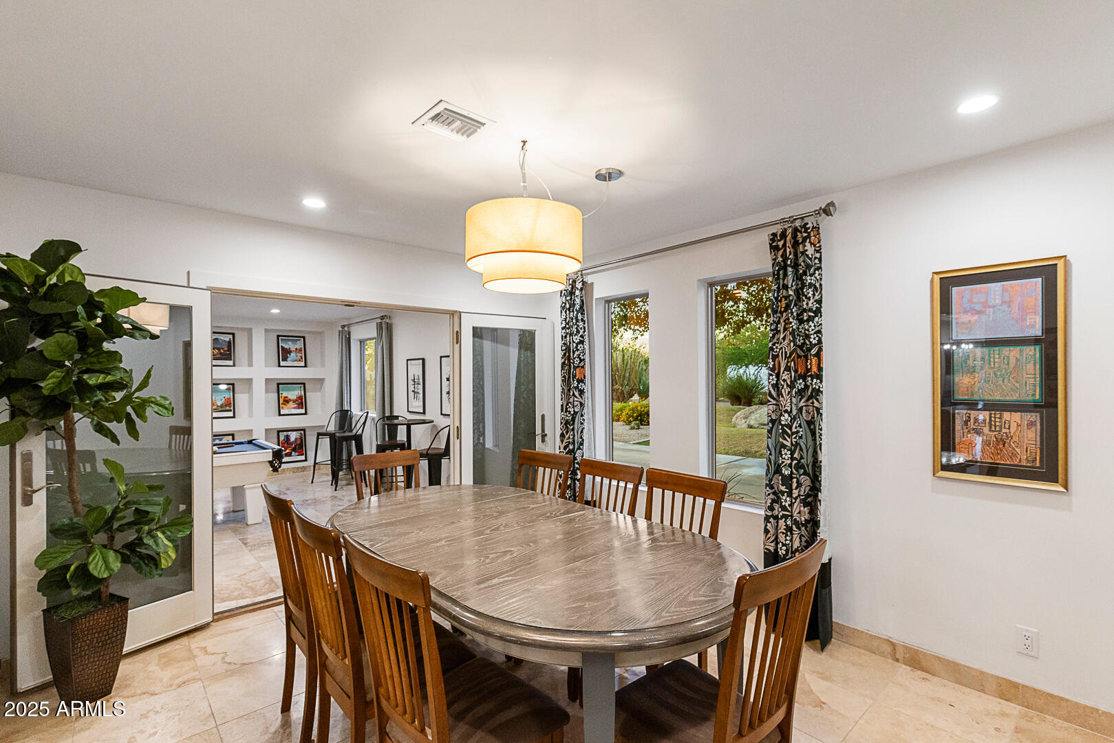8433 East Cholla Street Scottsdale, AZ 85260 - Photo 15 of 29 a dining room with furniture and window
