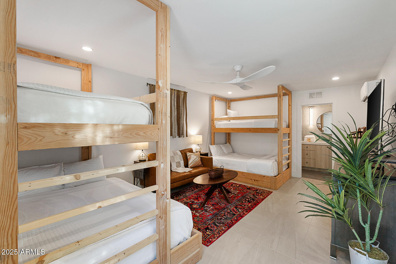 8433 East Cholla Street Scottsdale, AZ 85260 - Photo 22 of 29 a living room with furniture and a potted plant