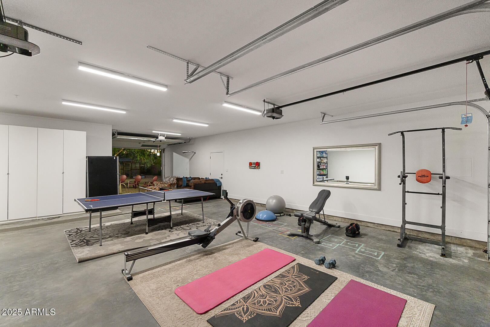 8433 East Cholla Street Scottsdale, AZ 85260 - Photo 26 of 29 a room with gym equipment and a table