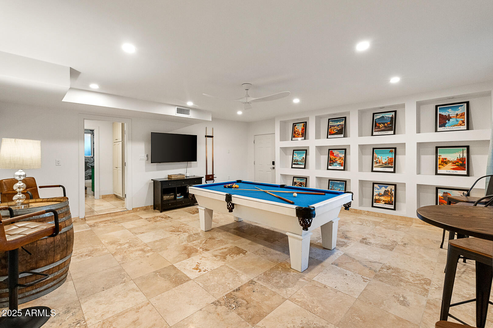 8433 East Cholla Street Scottsdale, AZ 85260 - Photo 9 of 29 a living room with furniture and a flat screen tv