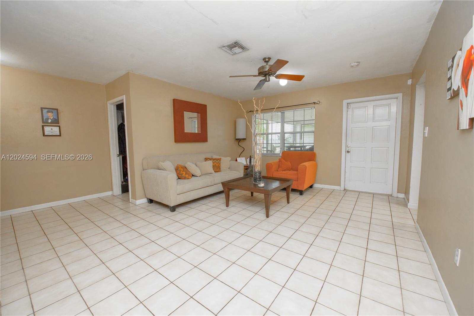 17355 Southwest 256th Street Homestead, FL 33031 - Photo 6 of 32 a living room with furniture