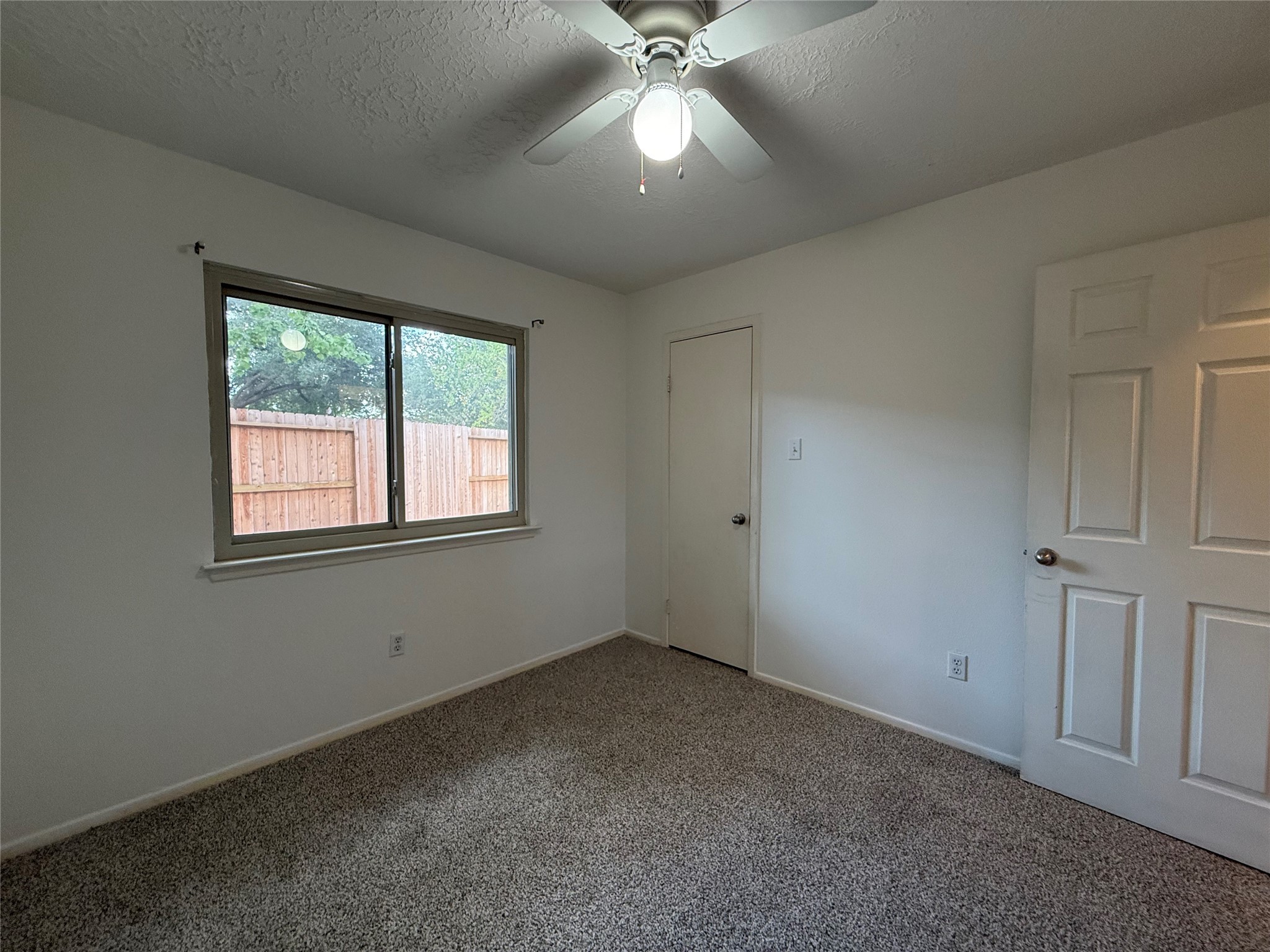 4722 Enchanted Rock Lane Spring, TX 77388 - Photo 12 of 22 a view of an empty room with a window