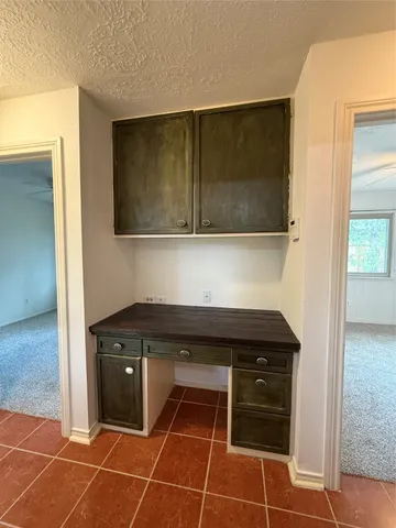 a kitchen with a sink and a washing machine