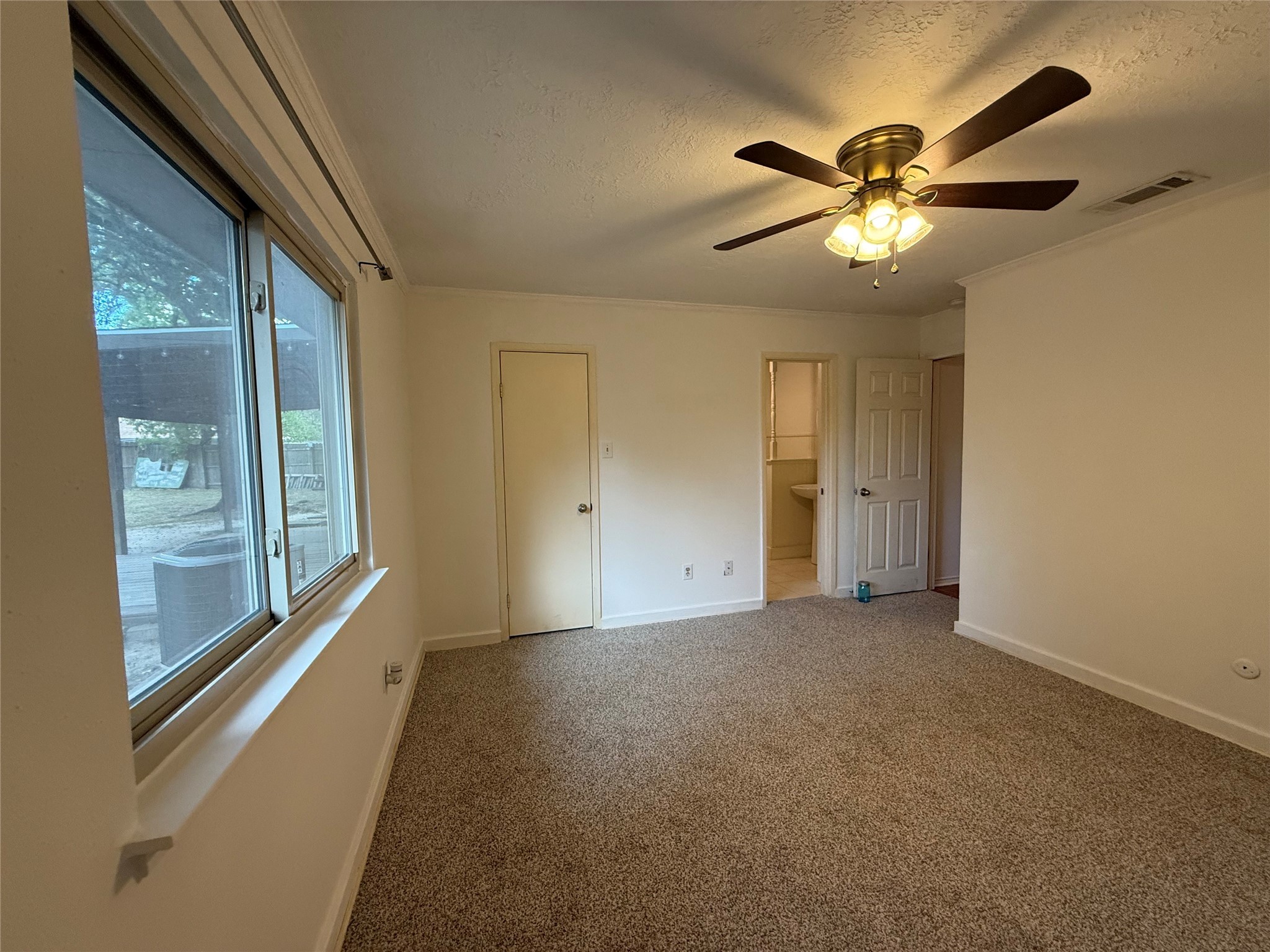 4722 Enchanted Rock Lane Spring, TX 77388 - Photo 7 of 22 a view of an empty room with a window