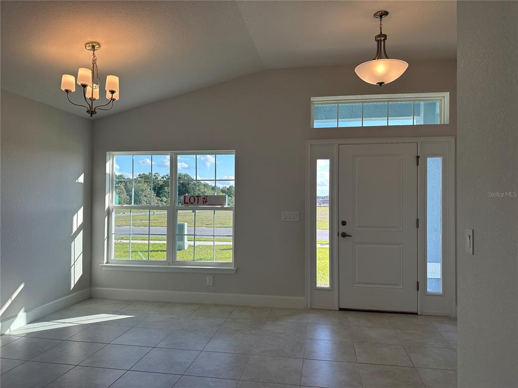 4413 Southwest 90th Place Ocala, FL 34476 - Photo 17 of 17 a view of an empty room with a window