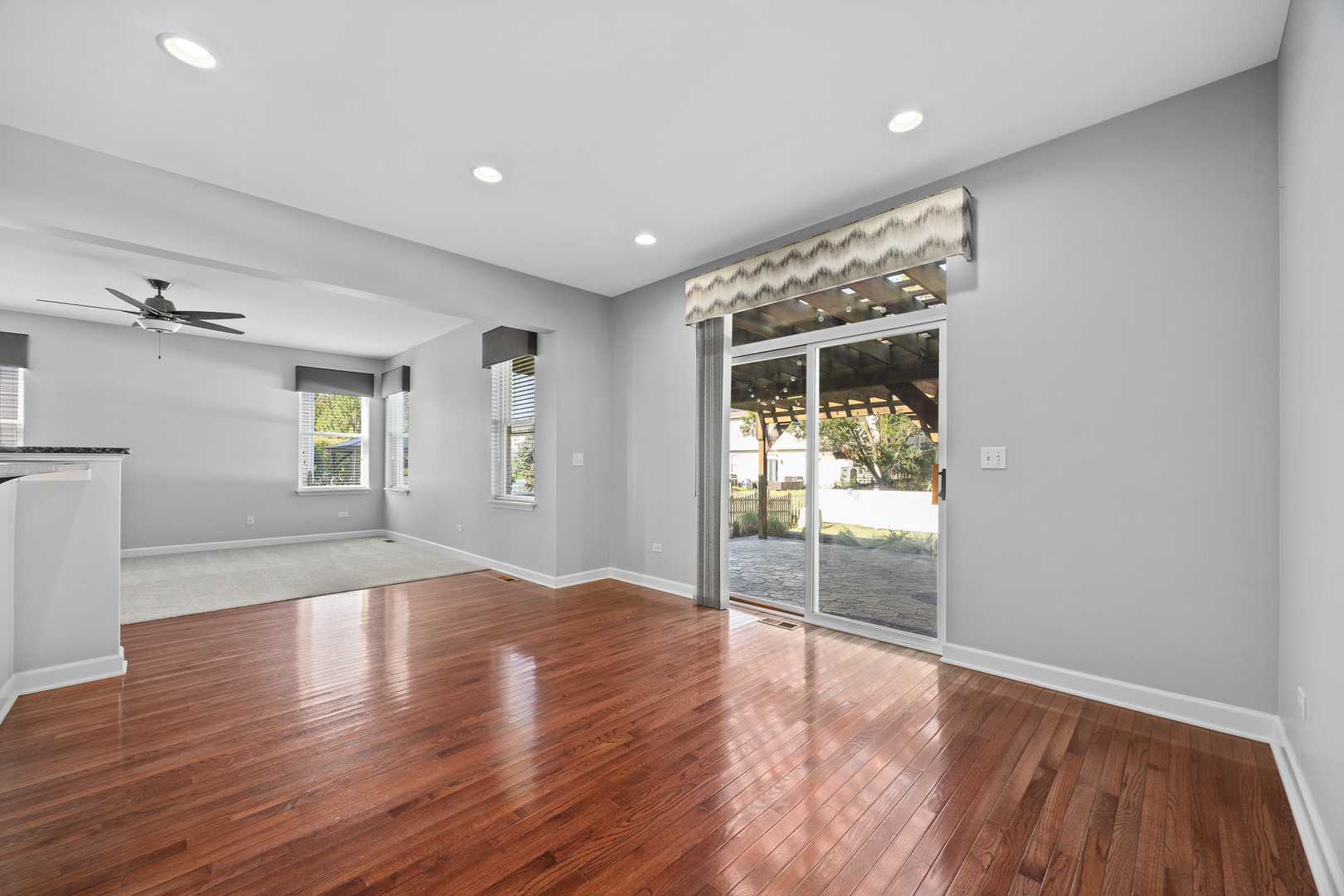 725 Delacourte Avenue Bolingbrook, IL 60490 - Photo 12 of 38 a view of empty room with wooden floor and fan