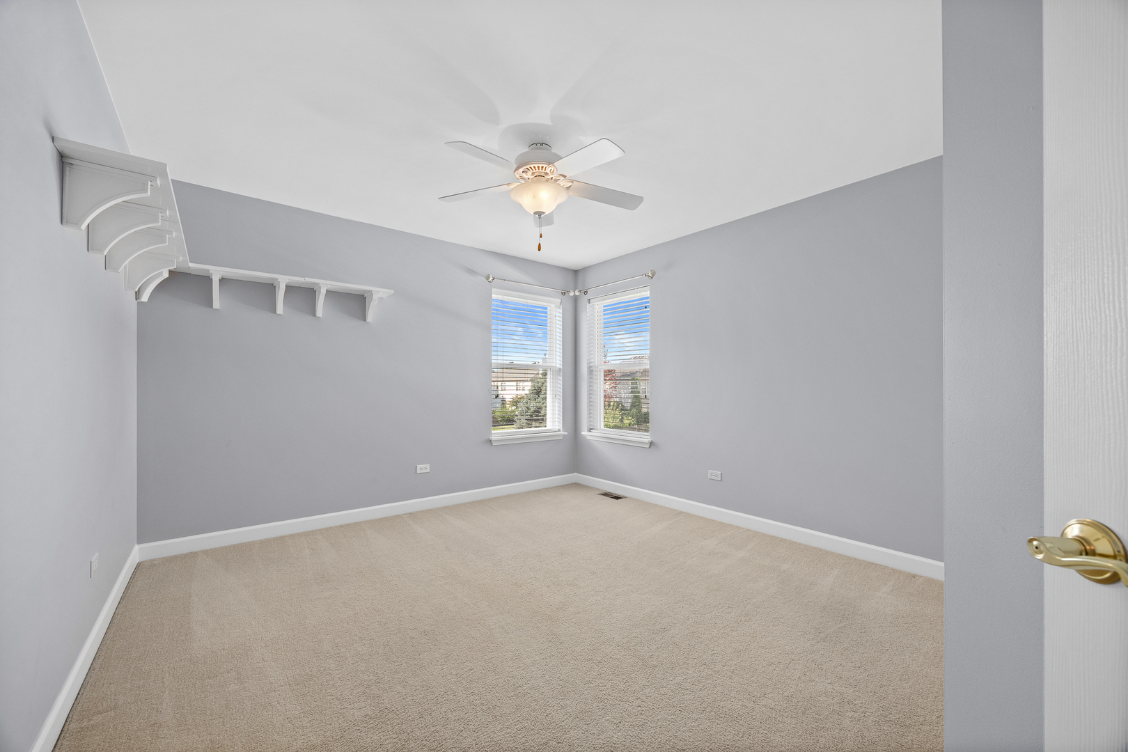 725 Delacourte Avenue Bolingbrook, IL 60490 - Photo 24 of 38 a view of an empty room with a window