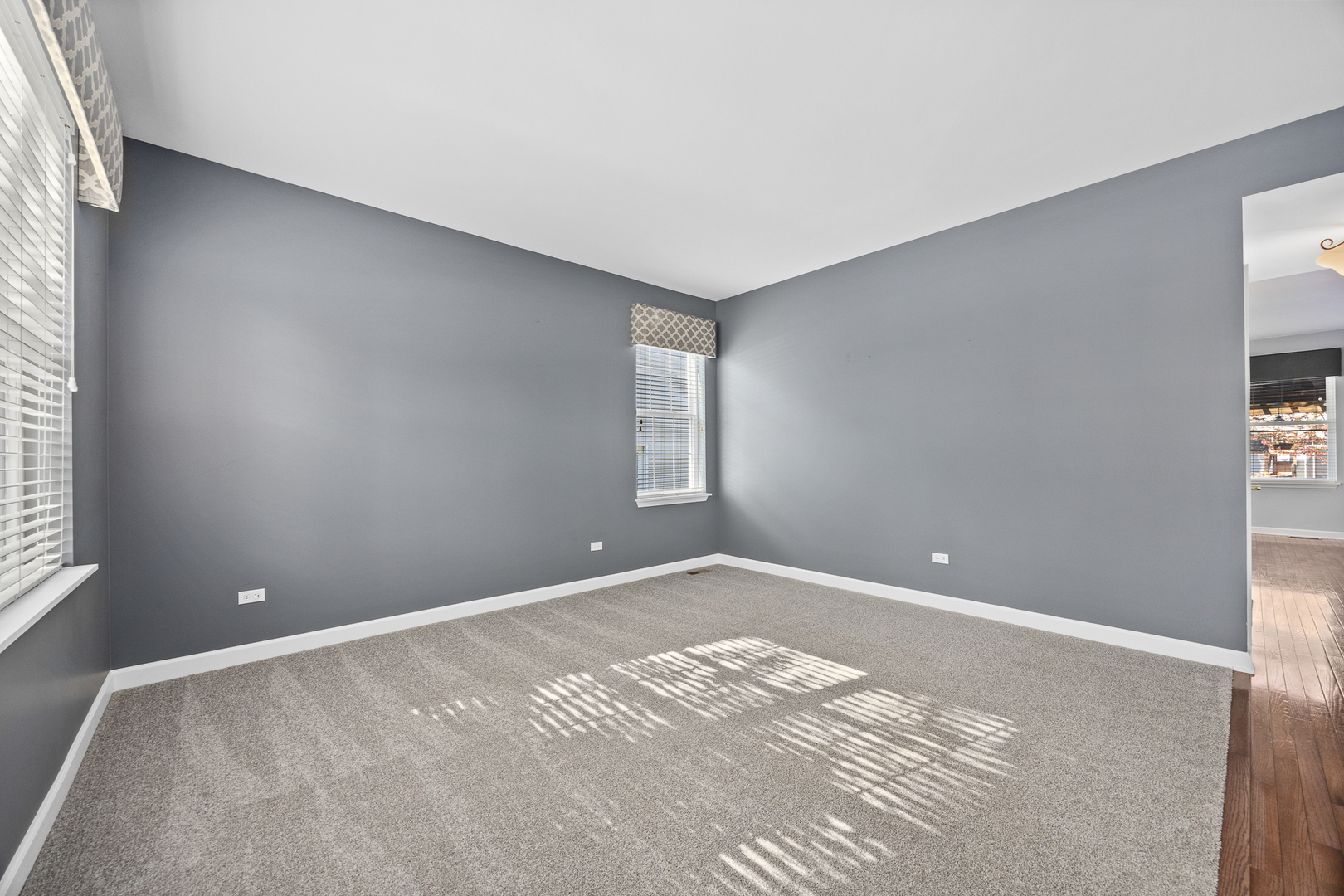 725 Delacourte Avenue Bolingbrook, IL 60490 - Photo 4 of 38 a view of an empty room with a window