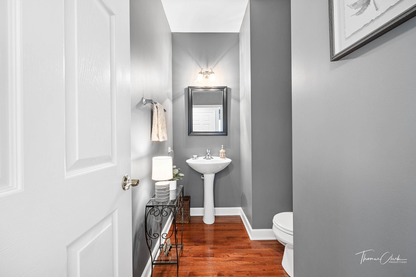 725 Delacourte Avenue Bolingbrook, IL 60490 - Photo 7 of 38 a view of a bathroom with a sink and a mirror