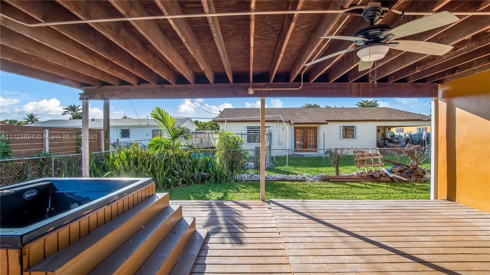20020 Southwest 112th Avenue Miami, FL 33189 - Photo 35 of 39 a view of a backyard with sitting area