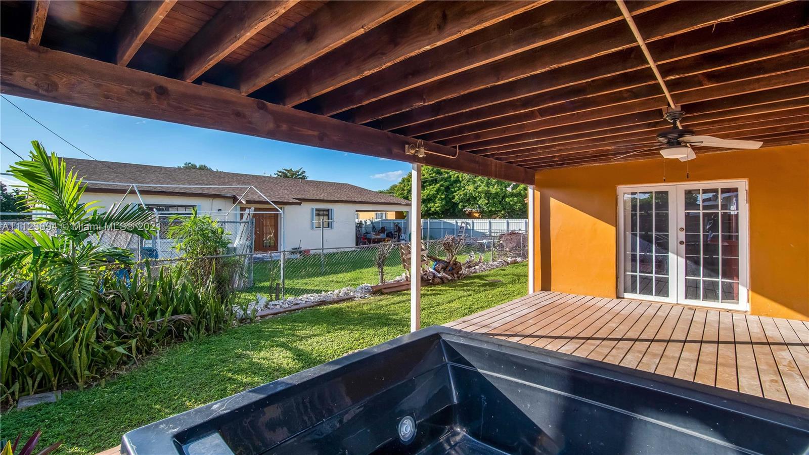 20020 Southwest 112th Avenue Miami, FL 33189 - Photo 36 of 39 a house view with a garden space