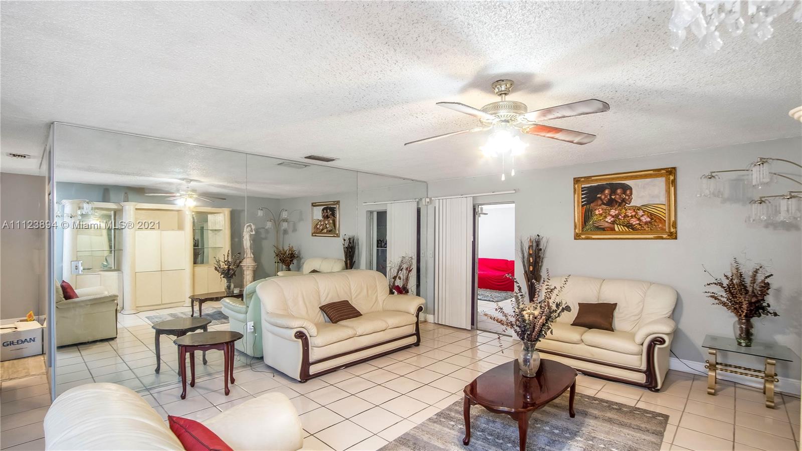 20020 Southwest 112th Avenue Miami, FL 33189 - Photo 6 of 39 a bedroom with furniture and a large window