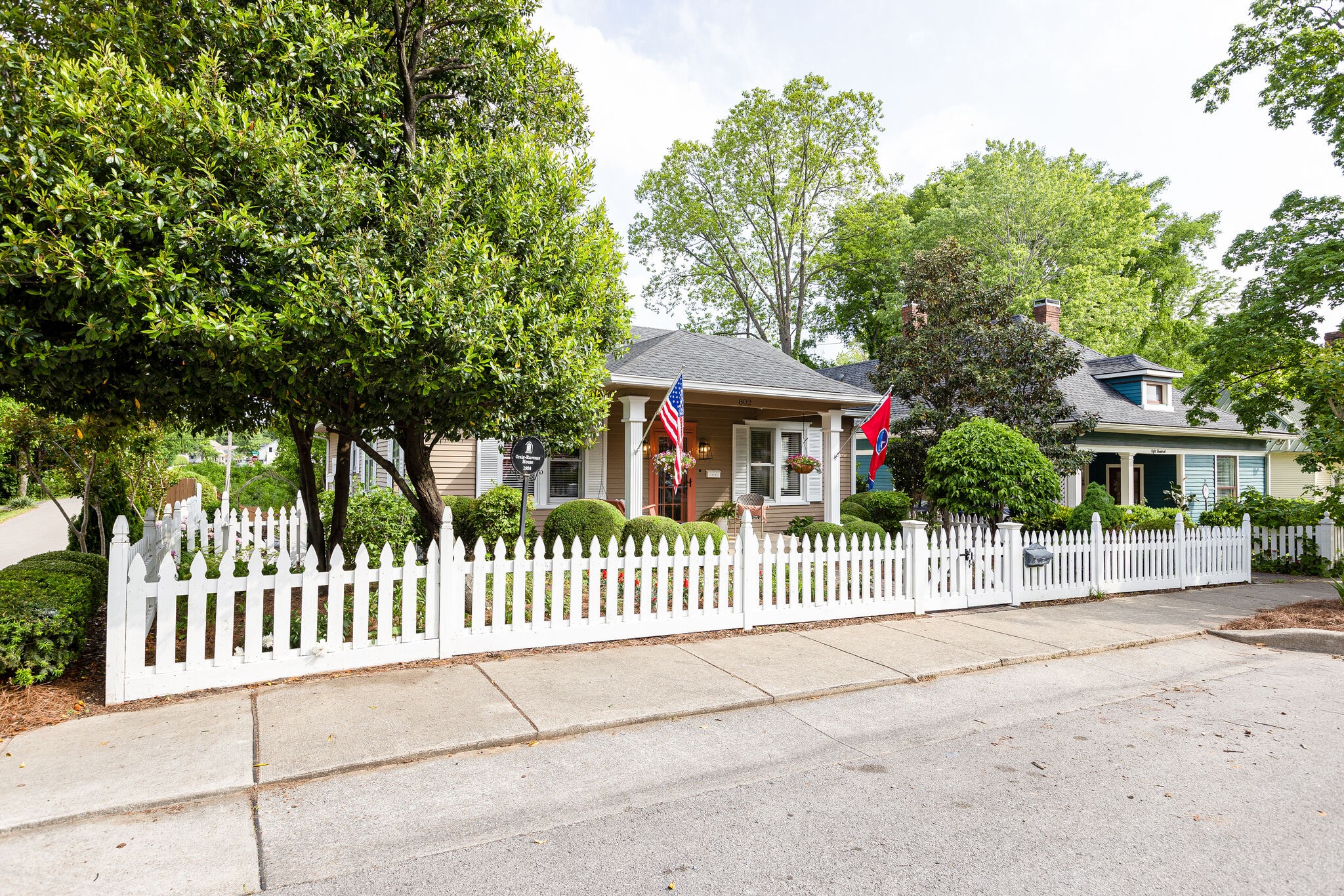802 Fair Street Franklin, TN 37064 - Photo 3 of 70 a front view of a house with a garden