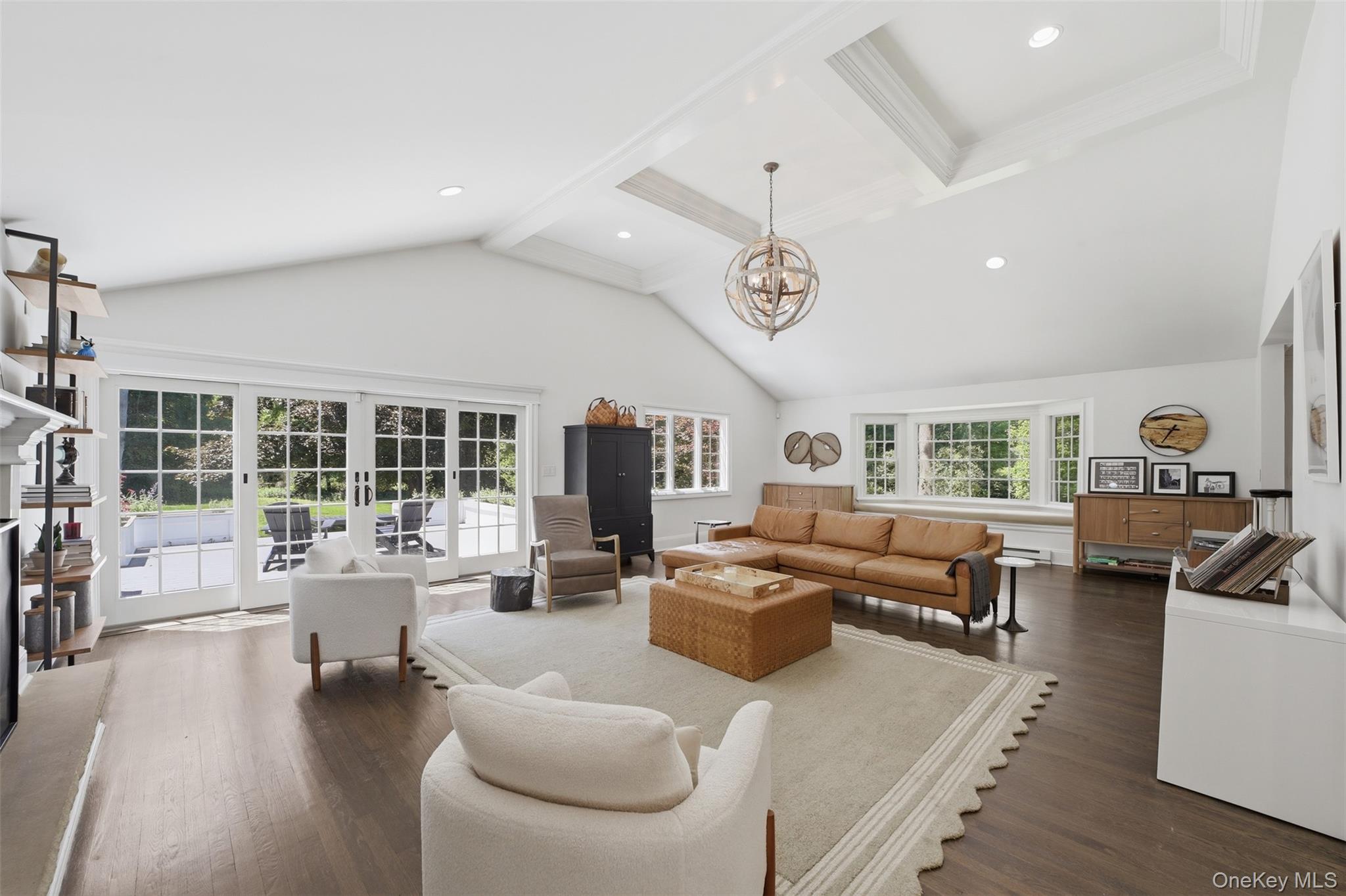 13 Schildbach Road Pound Ridge, NY 10576 - Photo 8 of 46 Soaring ceilings, fireplace, coffered ceiling, doors to sensational deck where nature surrounds you