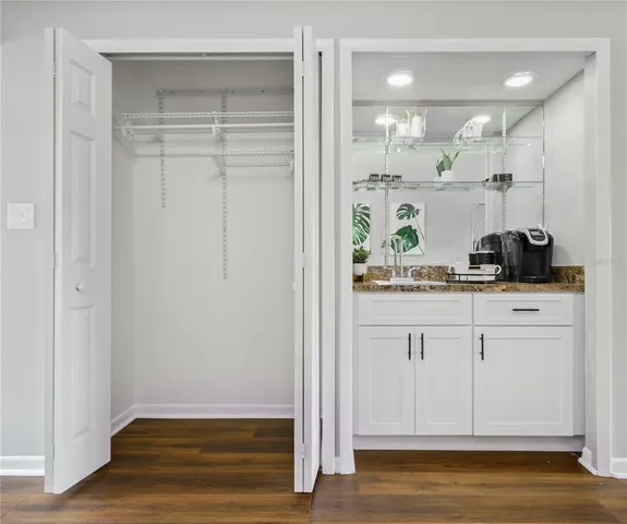 a view of kitchen with wooden floor