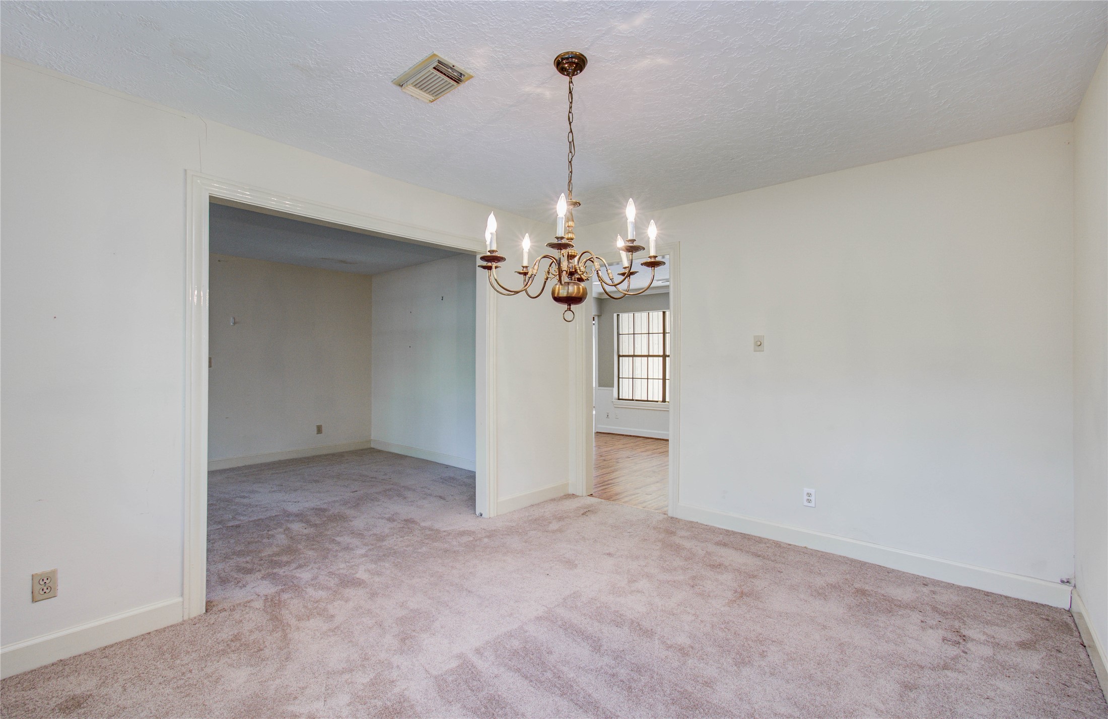 10715 East Timberwagon Circle Spring, TX 77380 - Photo 13 of 50 a view of a chandelier in big room and chandelier