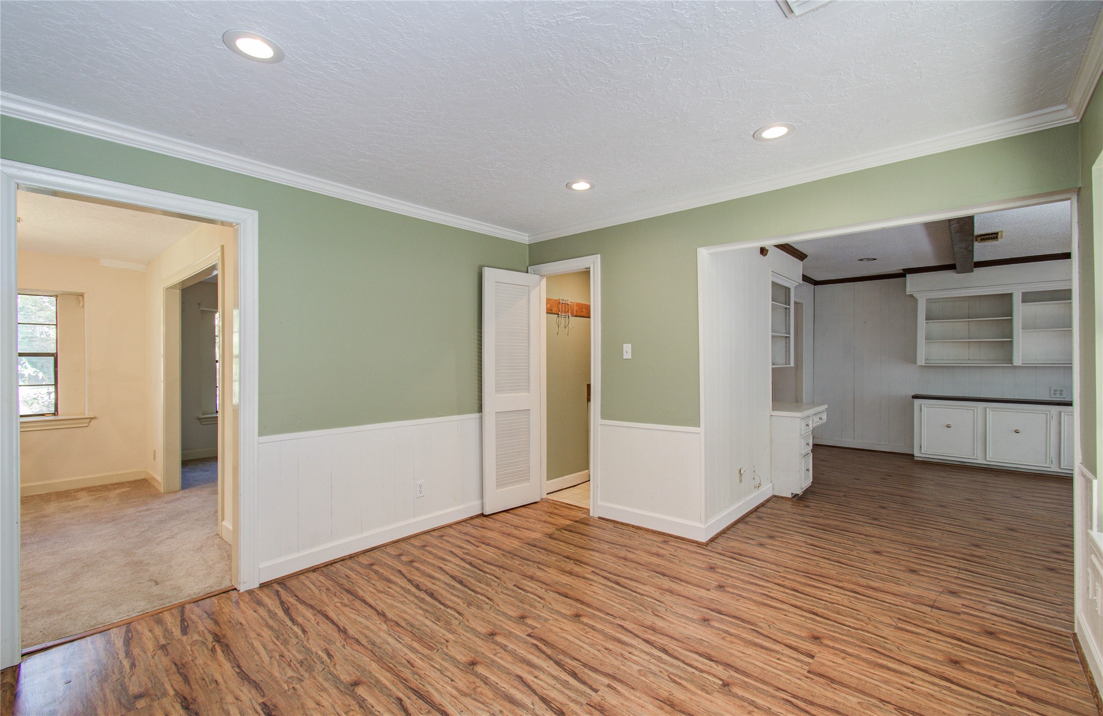 10715 East Timberwagon Circle Spring, TX 77380 - Photo 17 of 50 a view of empty room with wooden floor