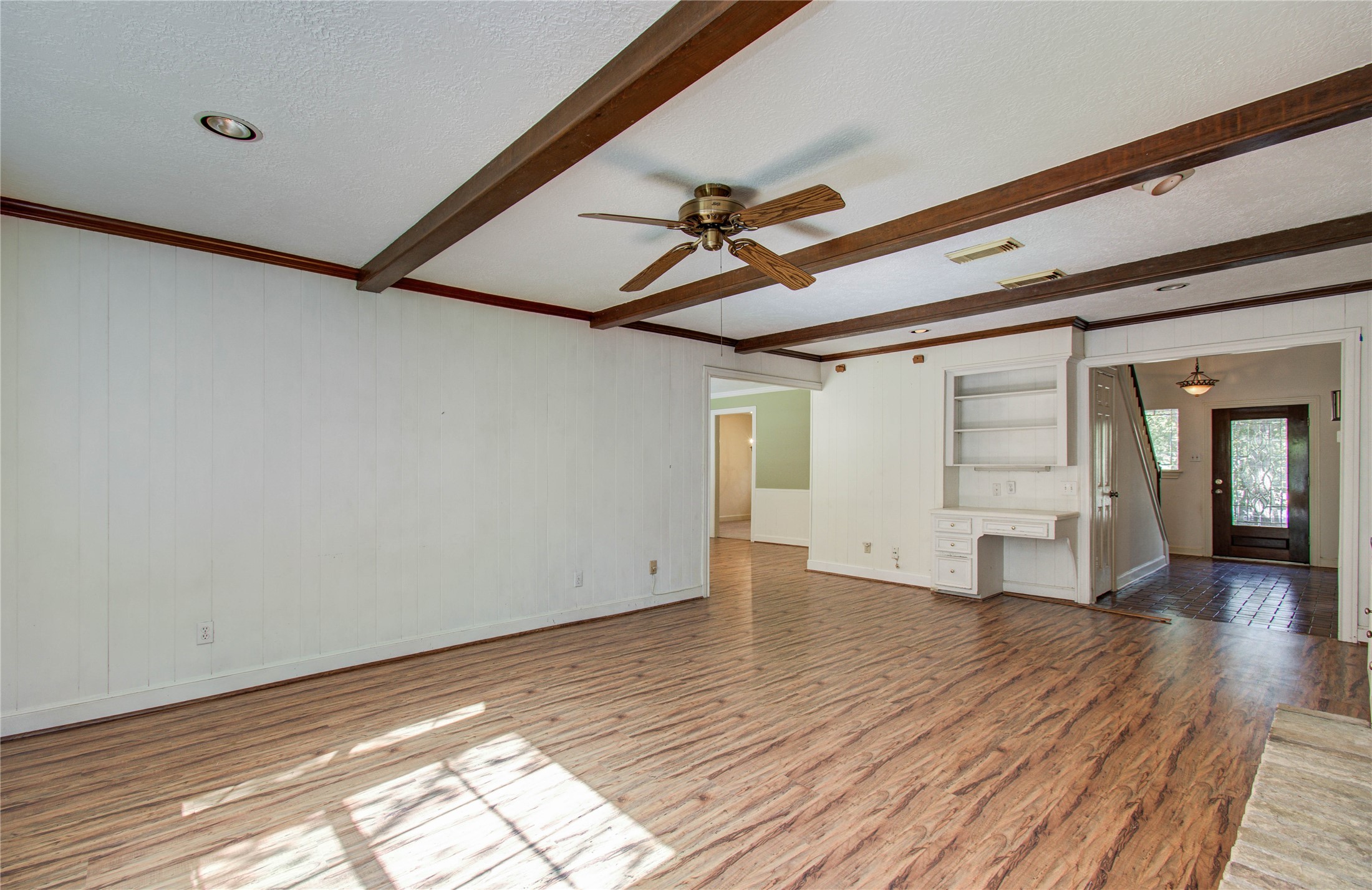 10715 East Timberwagon Circle Spring, TX 77380 - Photo 29 of 50 a view of an empty room with window and wooden floor