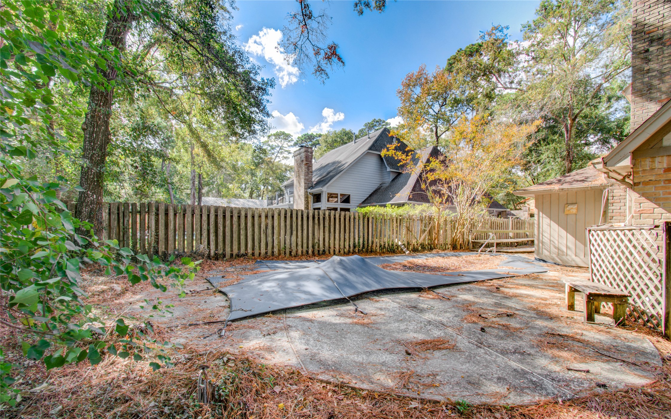 10715 East Timberwagon Circle Spring, TX 77380 - Photo 45 of 50 a view of a yard with plants and trees